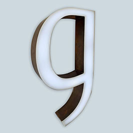 Built-up Rimless Illuminated Acrylic Letter with Brass Side Returns